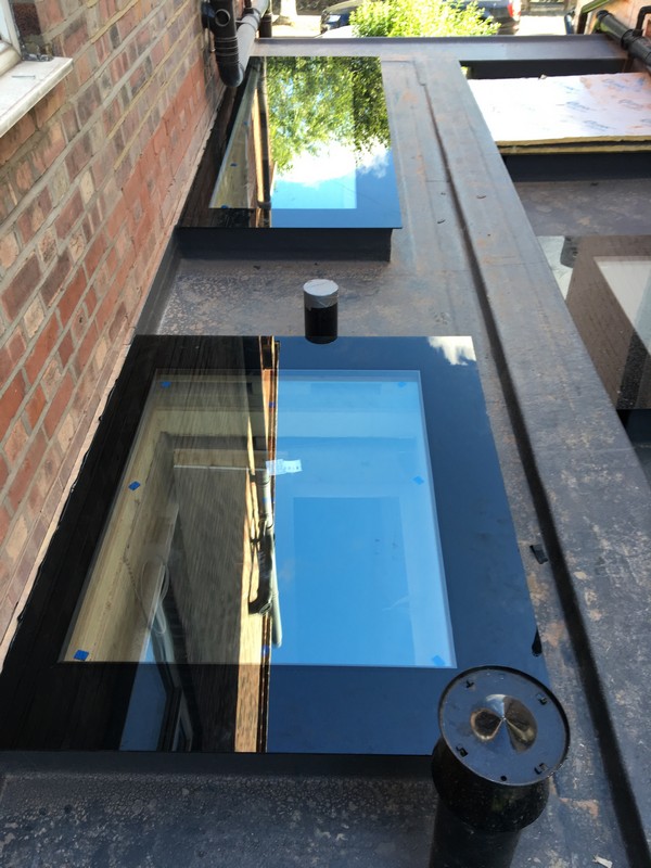 Multiple flat roof skylights on extension in Tring